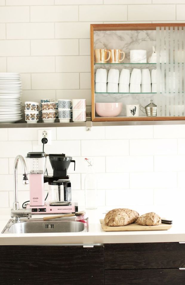 kitchen with pink & gold accents